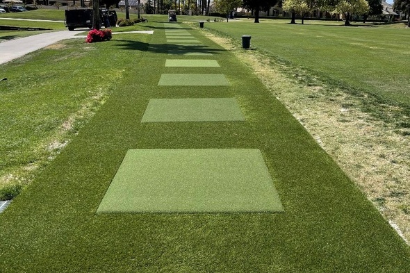 Tucson Outdoor tee line with light green synthetic grass boxes inside a dark green synthetic grass strip